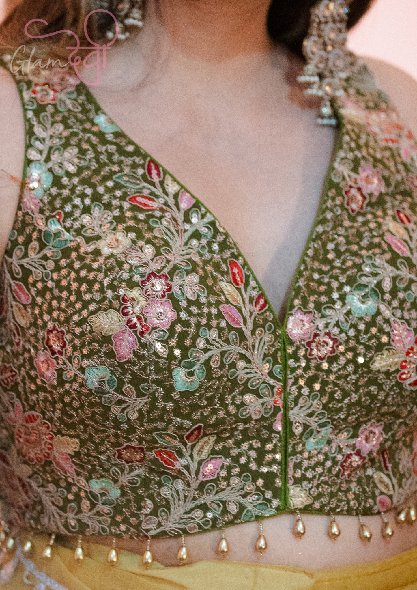 Olive Green Sleeveless Silk Blouse with Multi-Colour Floral Embroidery & Pearl Tassels | Glam Devi