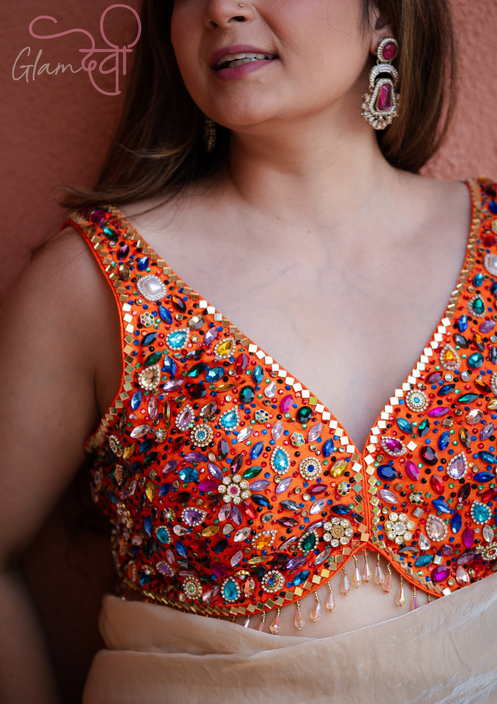 Orange Multi-Colour Stone Work Sleeveless Silk Blouse & Dori Tie-Up – Party Wear | Glam Devi