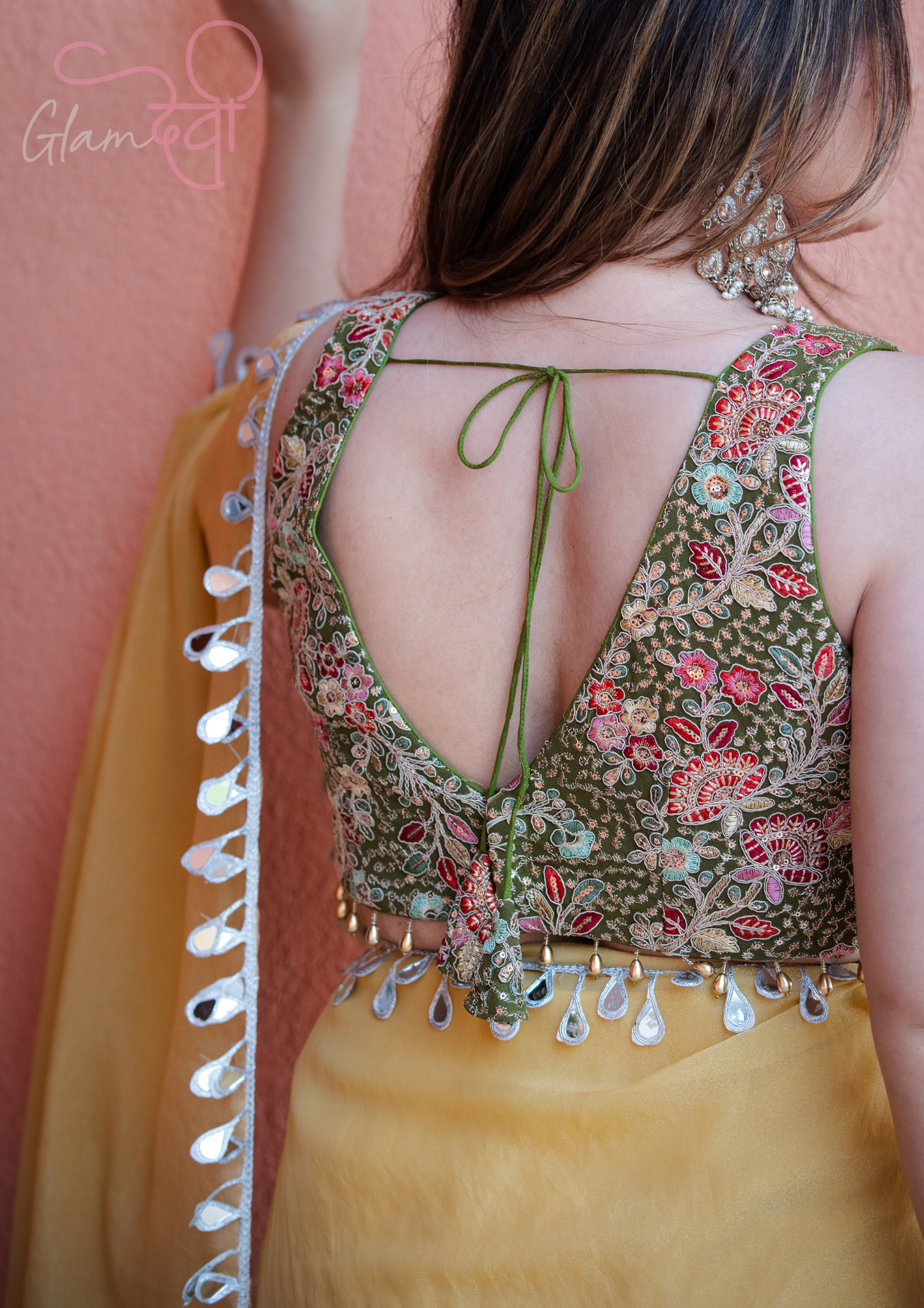 Olive Green Sleeveless Silk Blouse with Multi-Colour Floral Embroidery & Pearl Tassels | Glam Devi